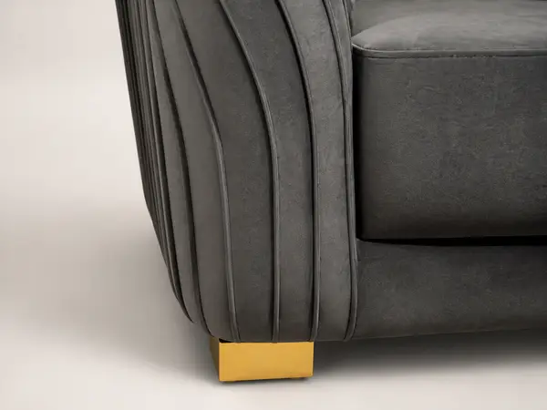 Charcoal velvet pleated-arm loveseat – close-up fabric detail