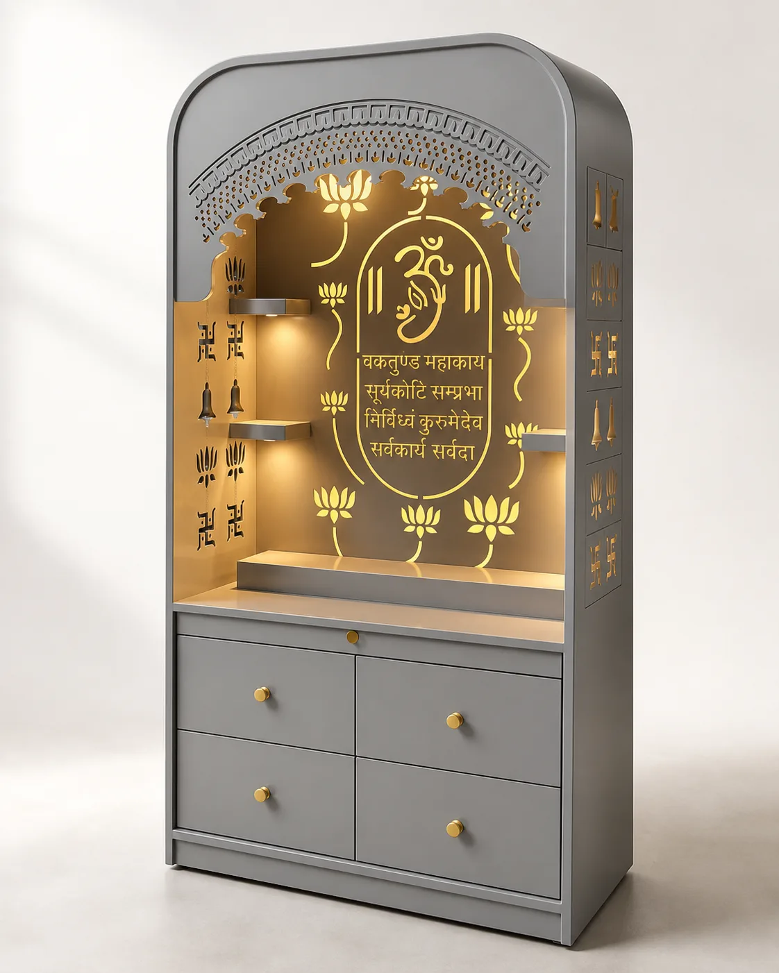 Grey arched mandir unit with gold Ganesh medallion and Ram naam jaali side panels.