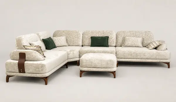 Cream velvet L-sofa with diamond-quilted channel back, front view