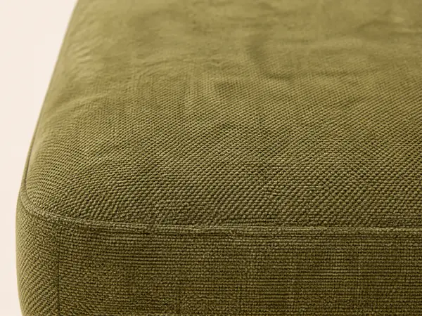Olive green textured sofa pair – close-up of textured fabric