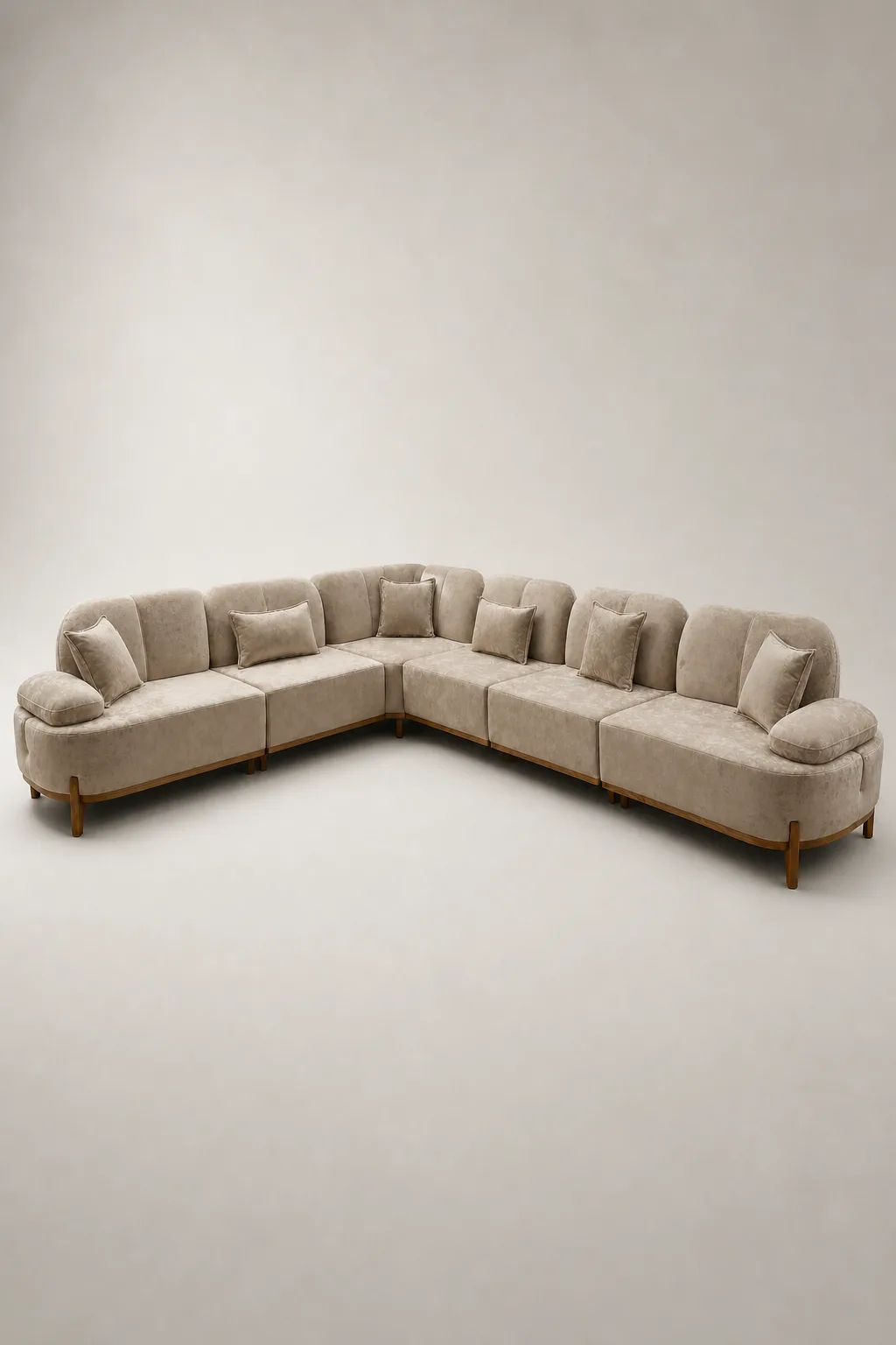 Tan extra-long U-shaped sectional sofa with channel-tufted backrests.