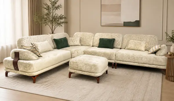Cream velvet sofa styled in a living room setting