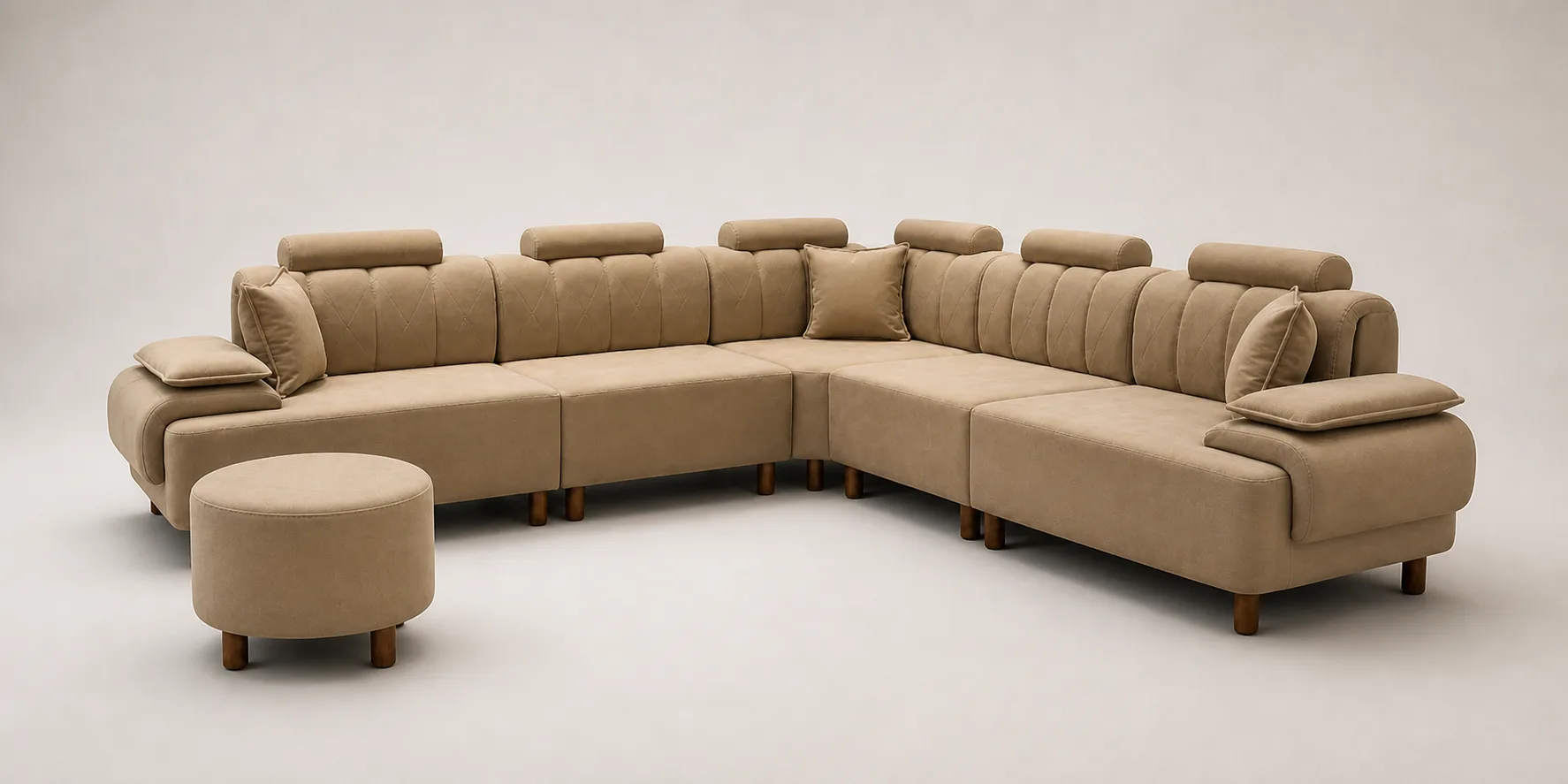 Taupe diamond-stitched channel-tufted L-shaped sofa with round pouf.