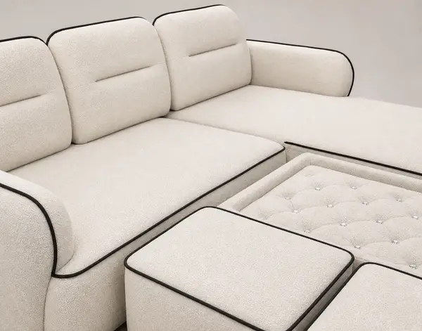 Close-up of the boucle texture and crystal-tufted ottoman