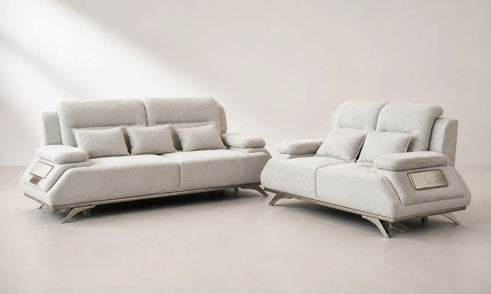 Light grey and silver 3+2 sofa set in a styled living room