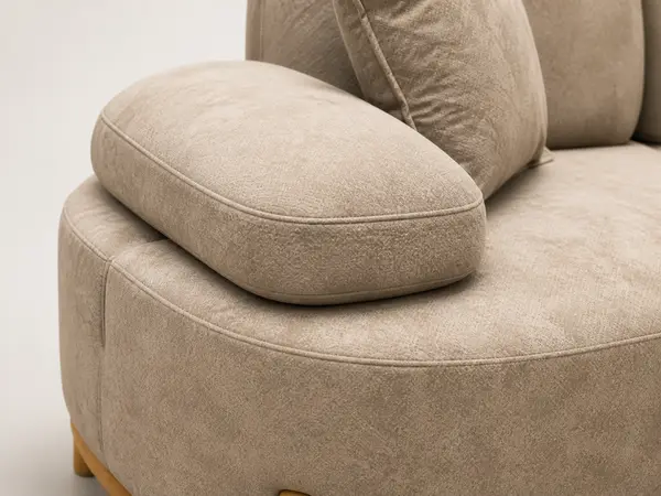 Close-up of upholstery texture on beige sectional