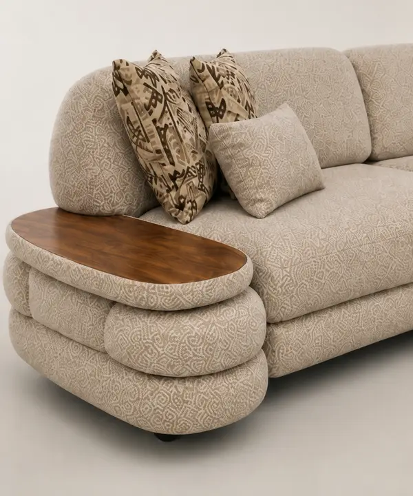 Close-up of built-in wood tray arm on beige jacquard sofa